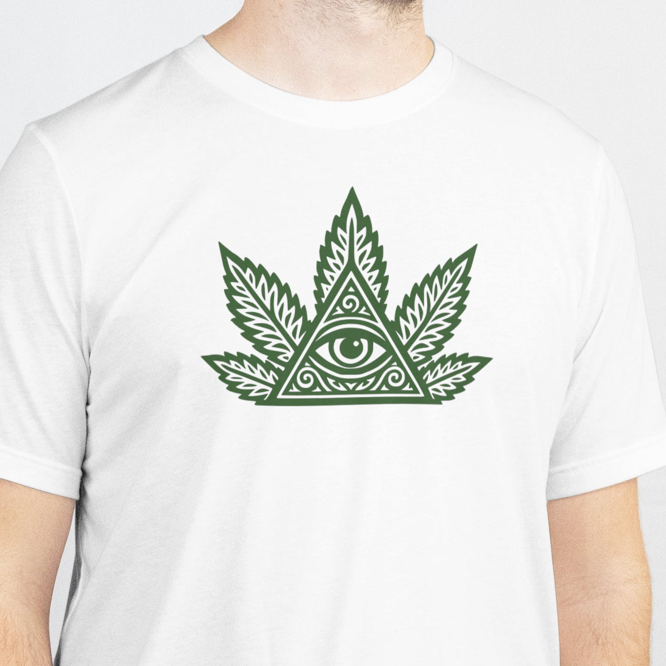 Man wearing a white t-shirt with a green cannabis leaf design on a plain background