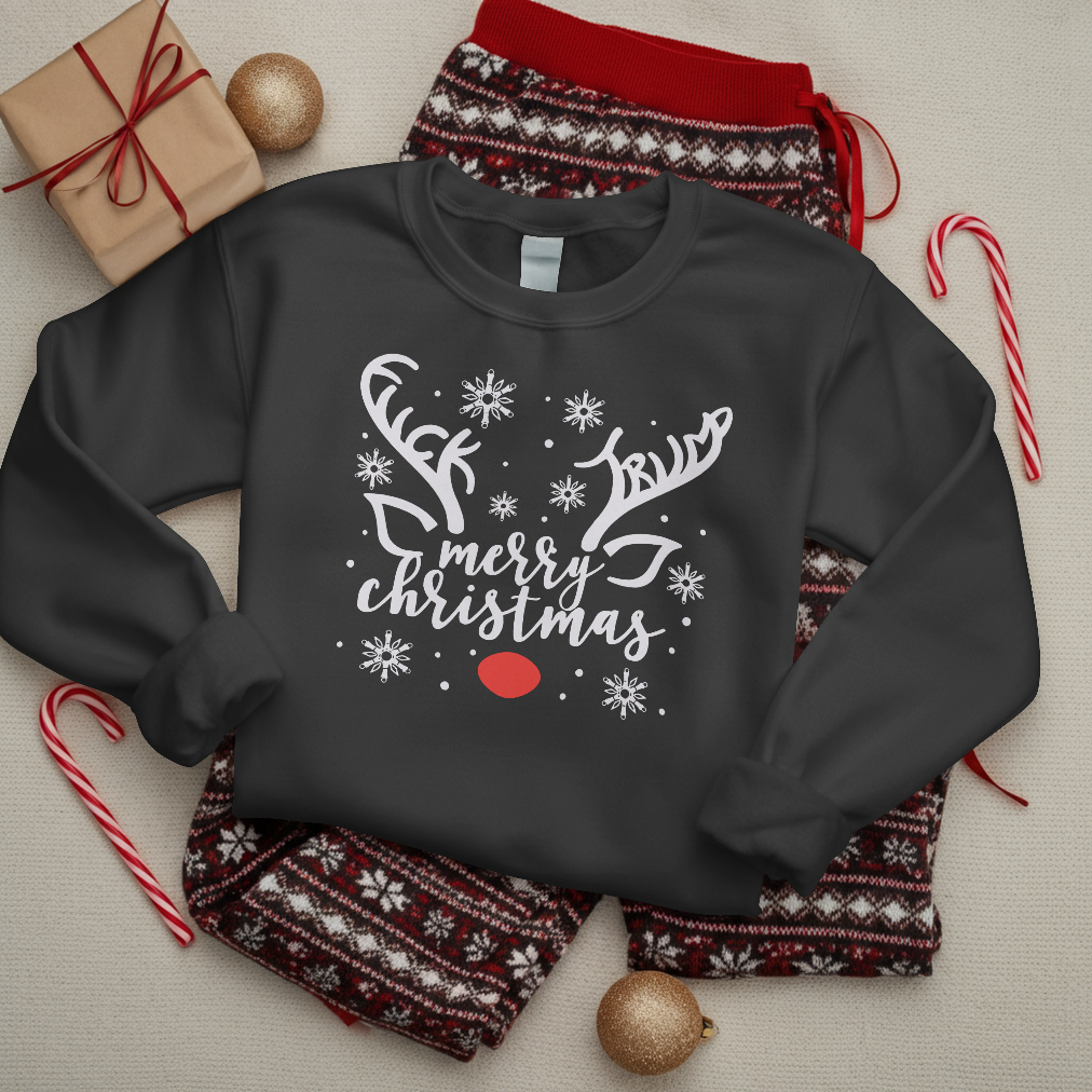 Black sweatshirt with Christmas design surrounded by festive items on a light background
