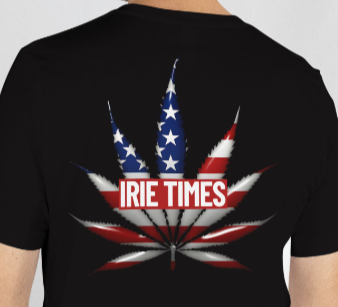 Man wearing a black t-shirt with a colorful design and 'IVIE TIMES' text on the back.