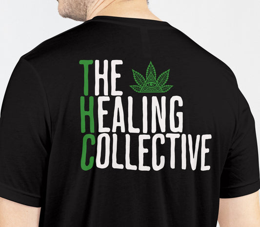 Person wearing a black t-shirt with 'The Healing Collective' text and logo on the back.