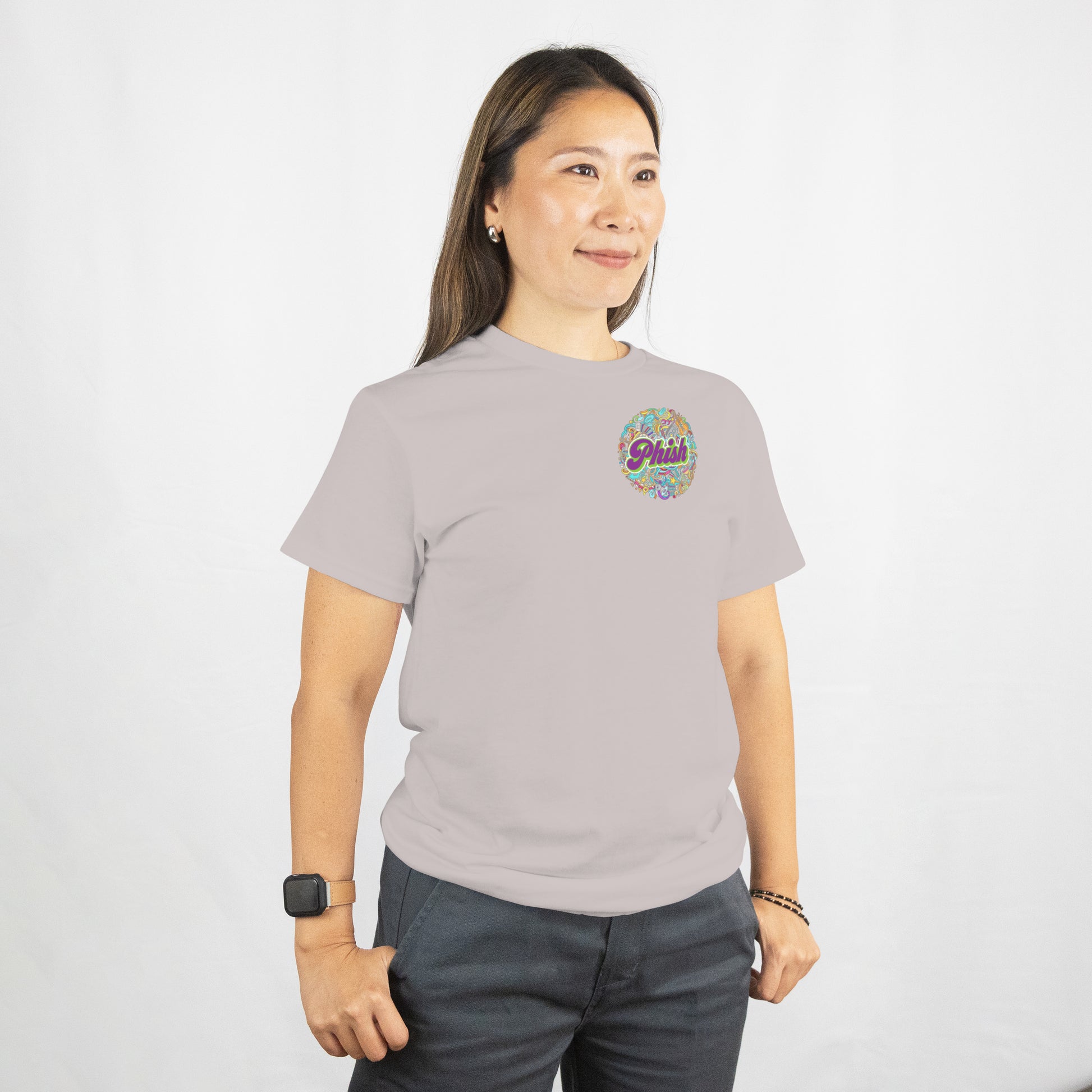 Person wearing a gray t-shirt with a colorful logo on a white background