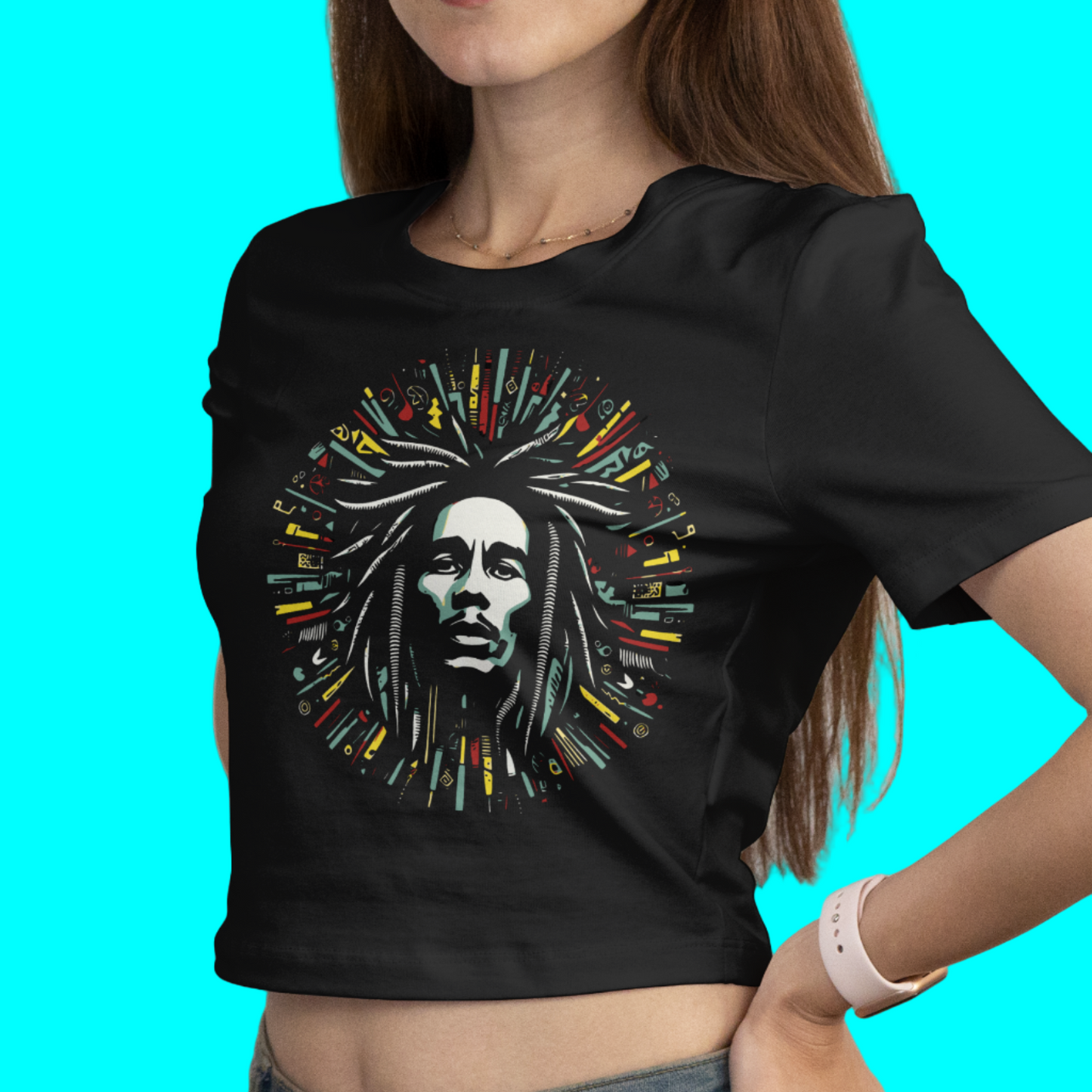 Woman wearing a black t-shirt with a colorful graphic design on a plain background