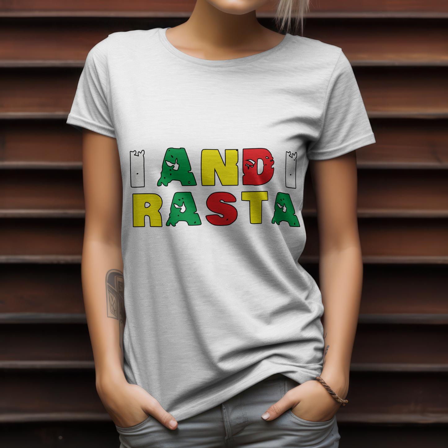 Person wearing a white t-shirt with 'HAND RASTA' in colorful letters against a wooden slat background