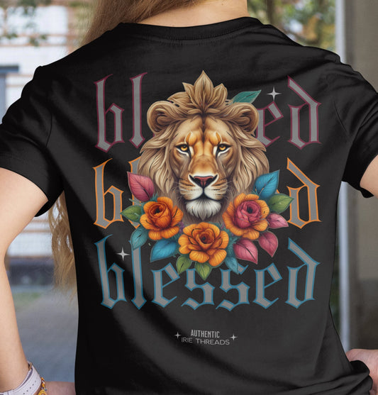 Person wearing a black t-shirt with a lion graphic and 'blessed' text.
